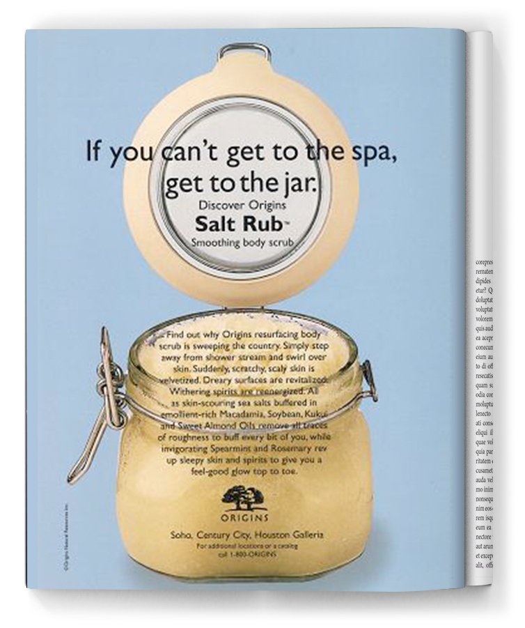 A magazine page featuring a jar of Salt Rub by Origins with the quote 'If you can't get to the spa, get to the jar' and detailed description of the product's benefits.